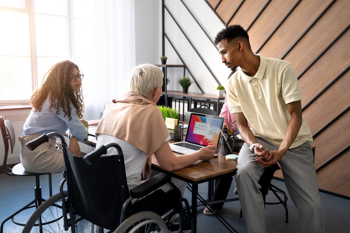 Support worker assisting person with physical disability